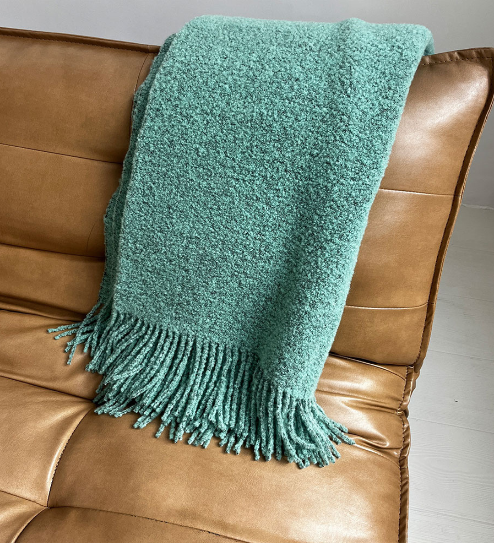 HELIOS Merino boucle blanket with fringe - sage green
