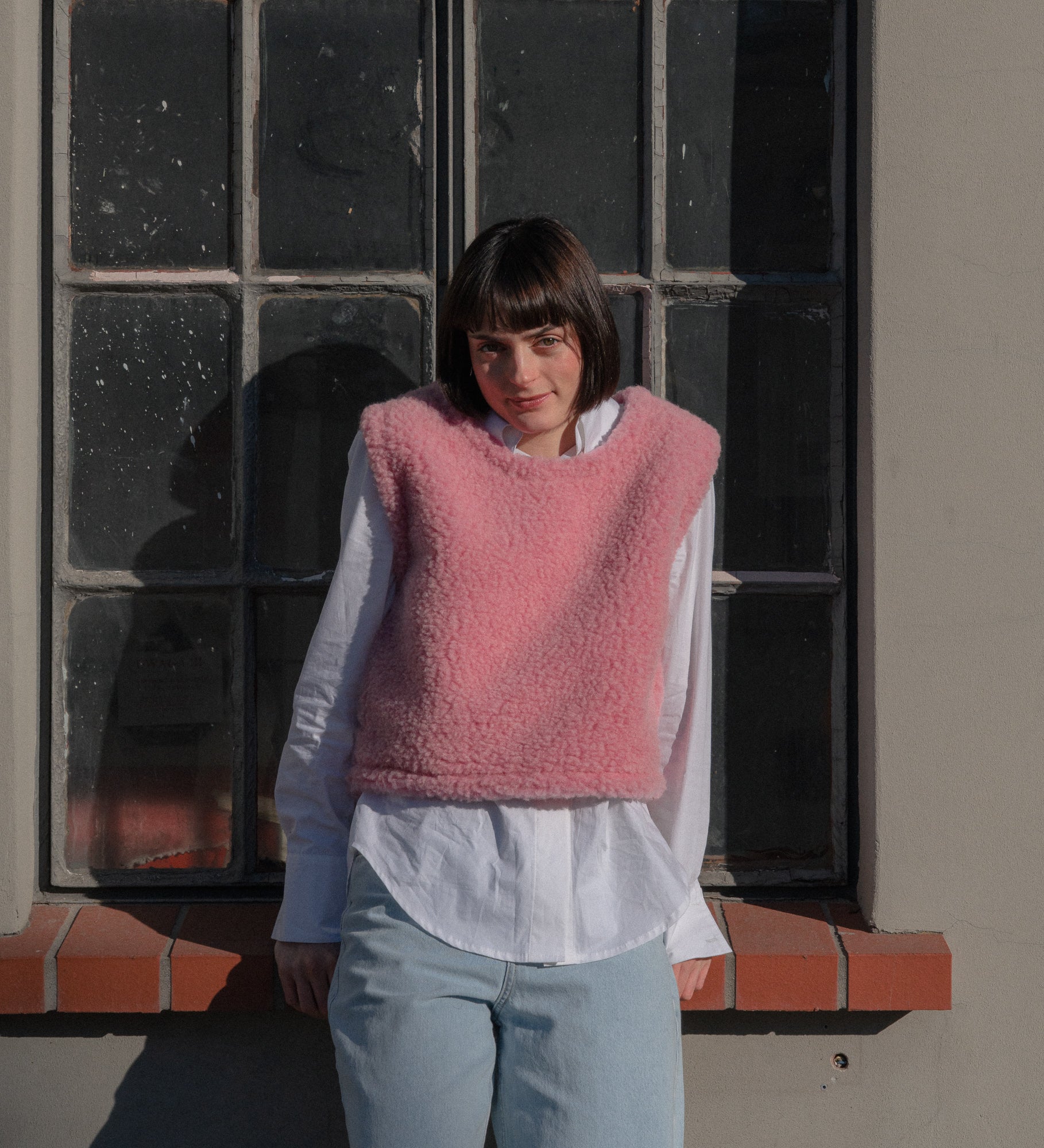 RUNA Kamizelka przez głowę z wełny merino - różana