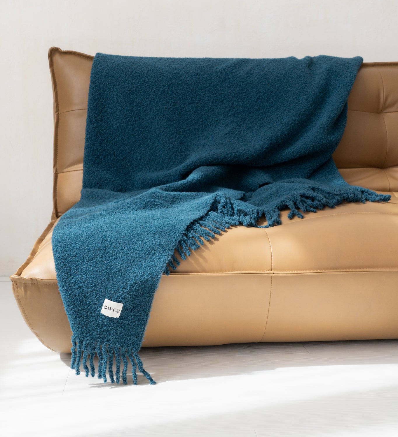 HELIOS Koc z merynosa z frędzlami boucle - morski