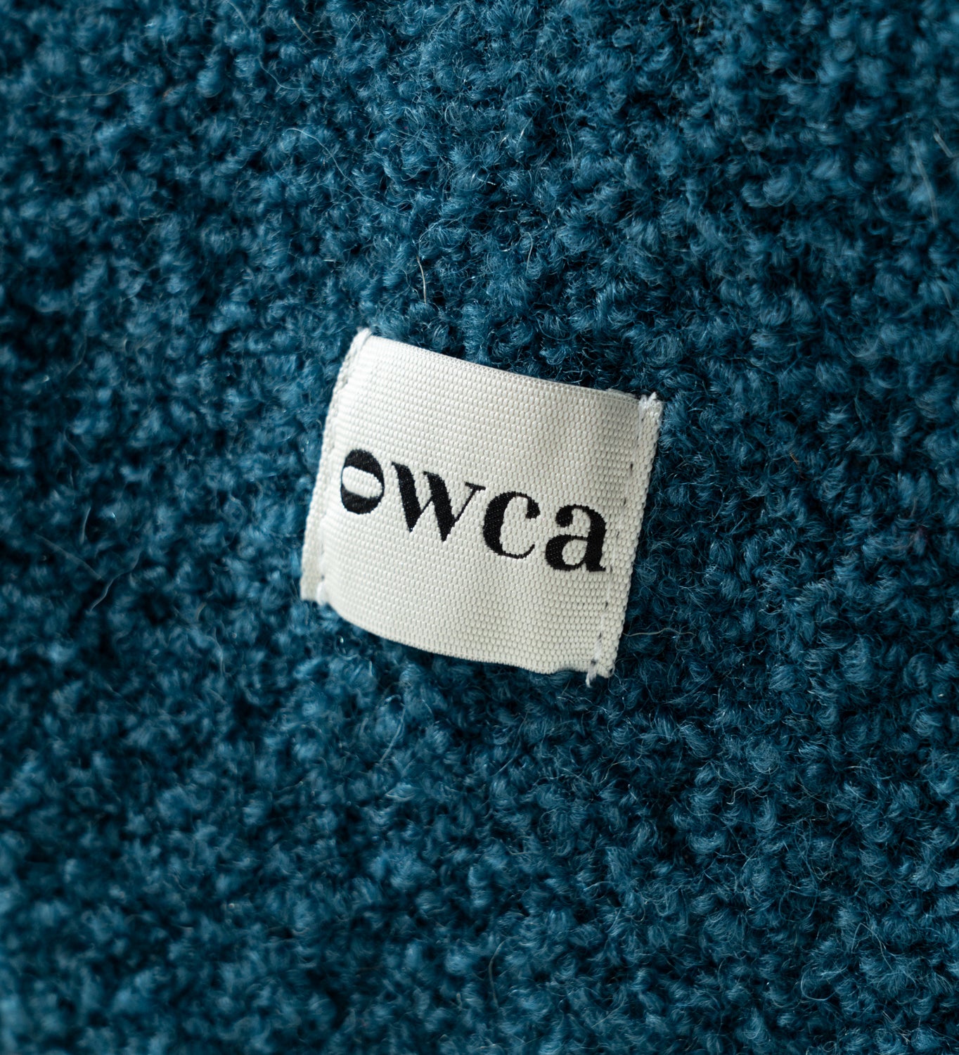 HELIOS Koc z merynosa z frędzlami boucle - morski